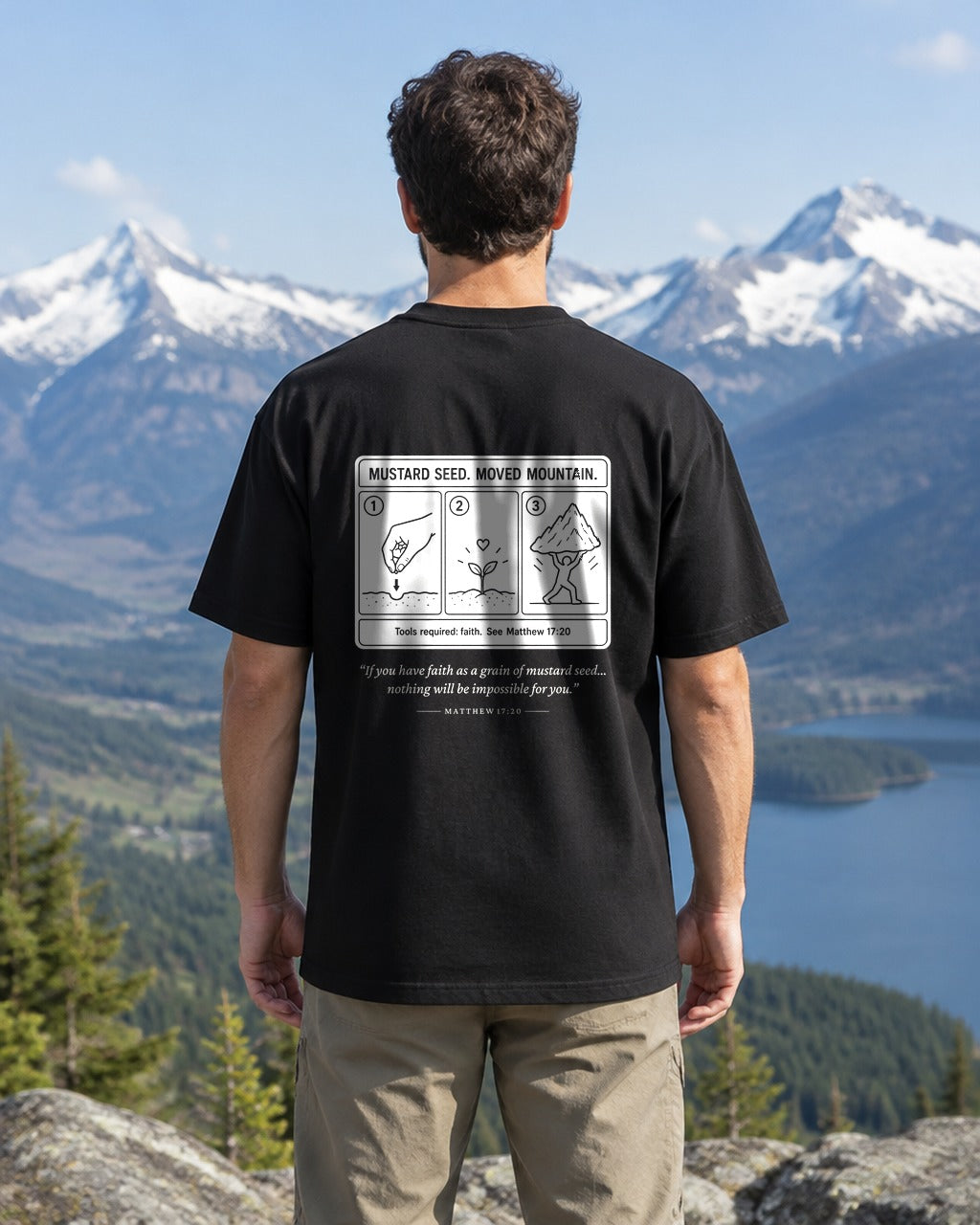 Mustard Seed 3 Steps tee at a mountain overlook, back view